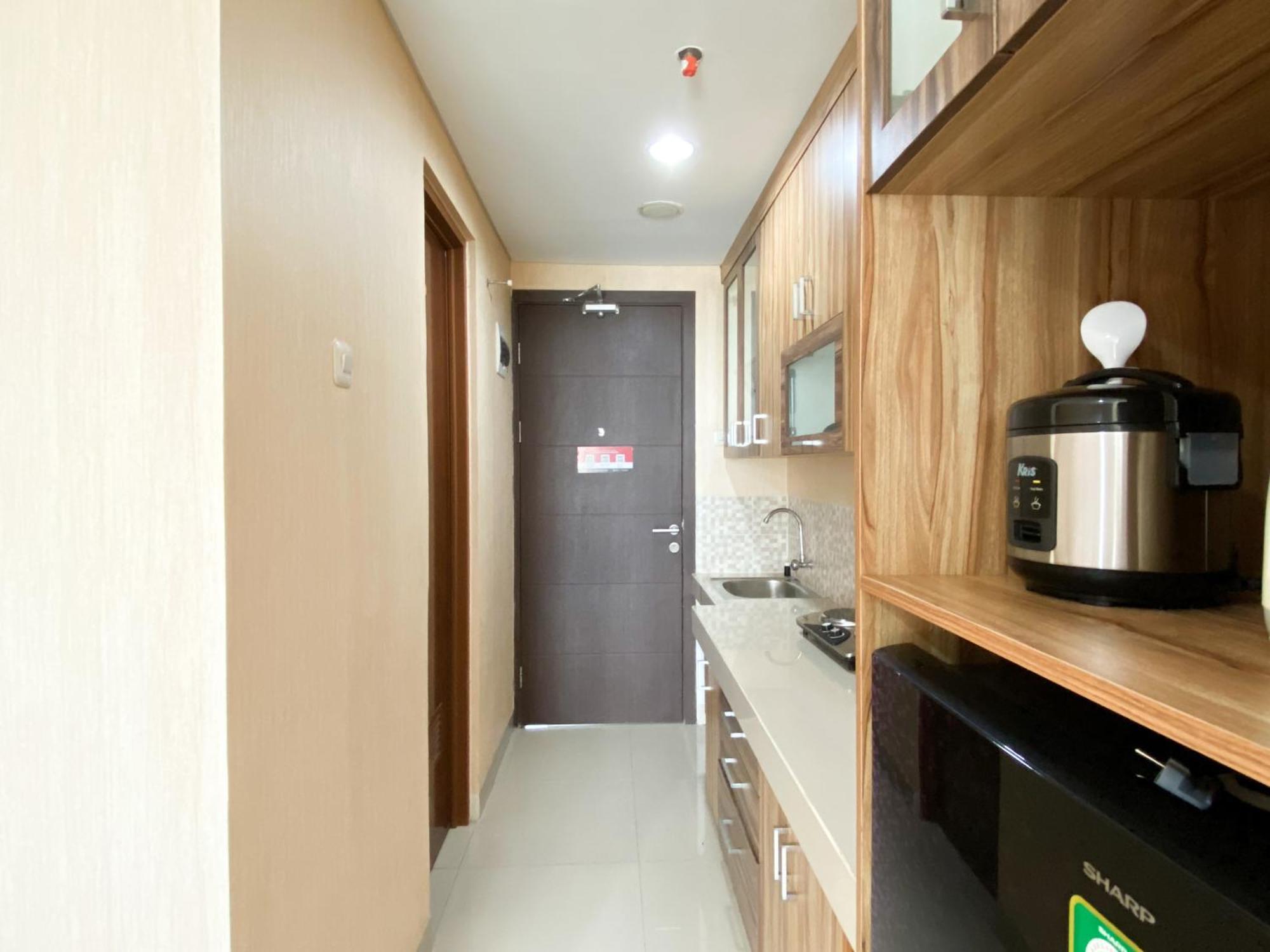 Apartemen Homey And Simply The Enviro By Travelio Cikarang