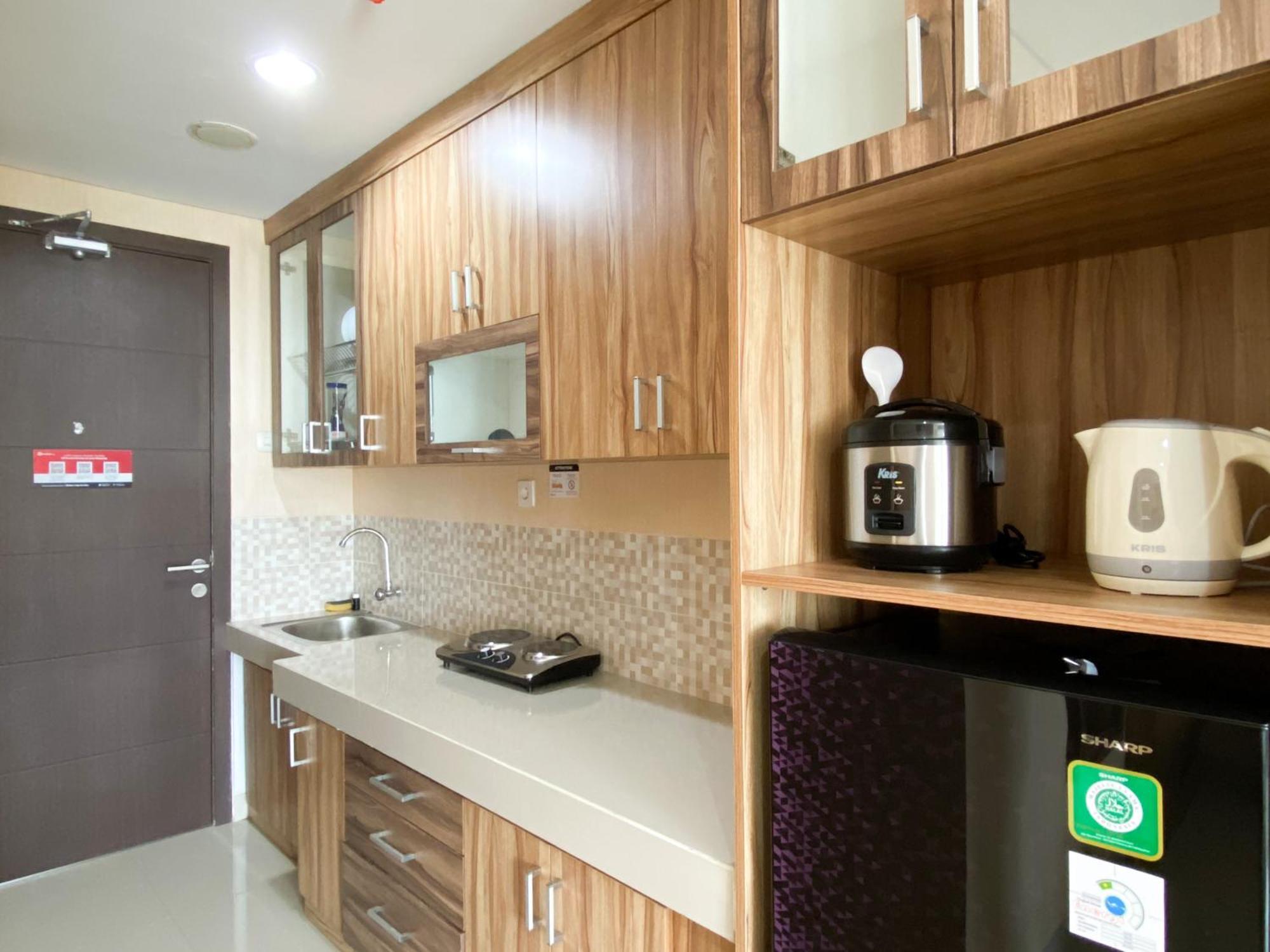 Homey And Simply The Enviro By Travelio Apartemen